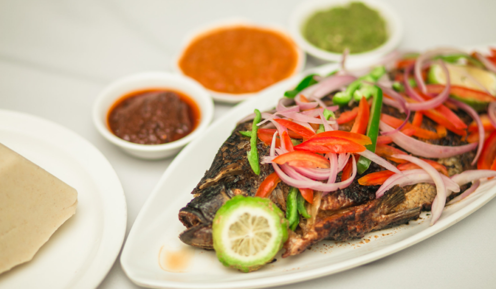 This image has an empty alt attribute; its file name is Makola-Market-Street-Food-Tour-7-1024x597.png