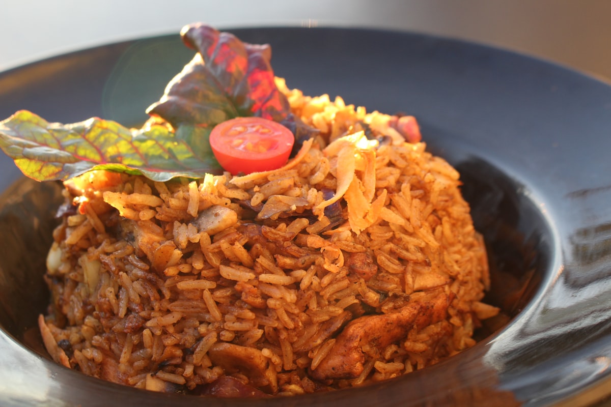 Tomato rice plate — jollof rice style West African dish
