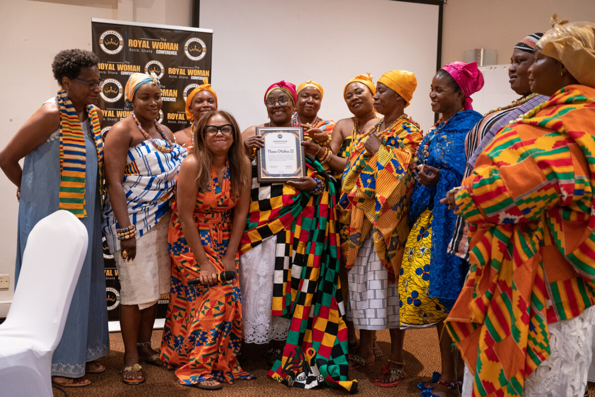 Women wearing kente and traditional cloth at a cultural celebration in Ghana