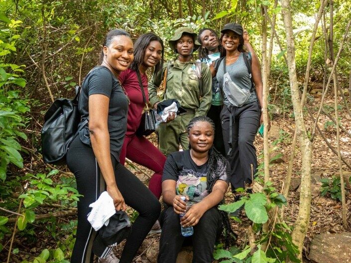 A guided hiking group at the trailhead near Akosombo, Ghana