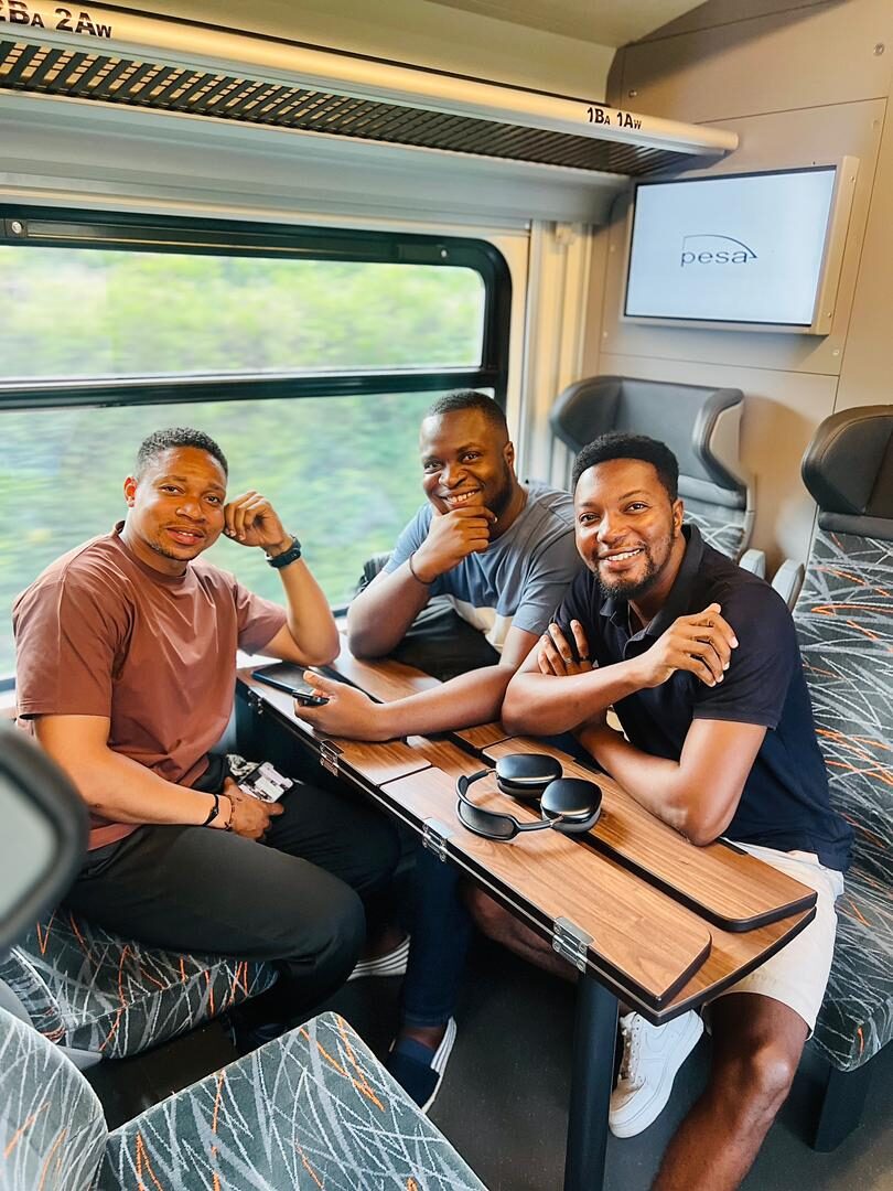 Guests travelling by train to a camping trip in Akosombo, Ghana