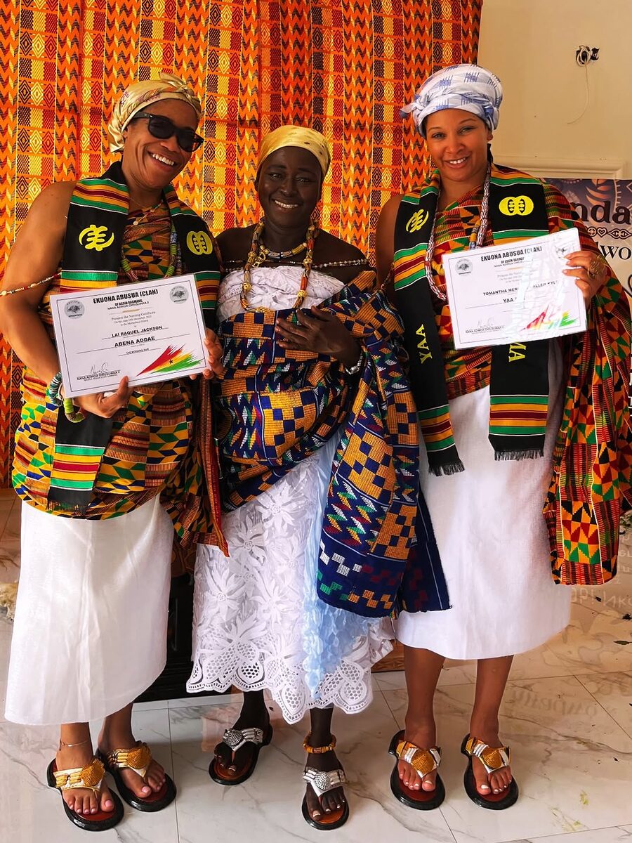 Guests with a traditional elder at a Ghanaian naming and outdooring ceremony